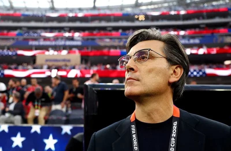 Coach observing the stadium before the match