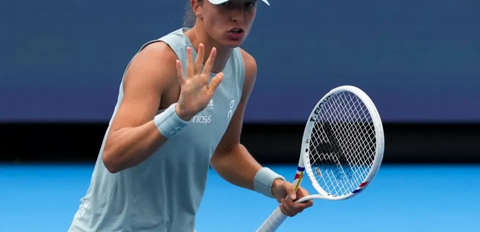 Tennis player gesturing during a match