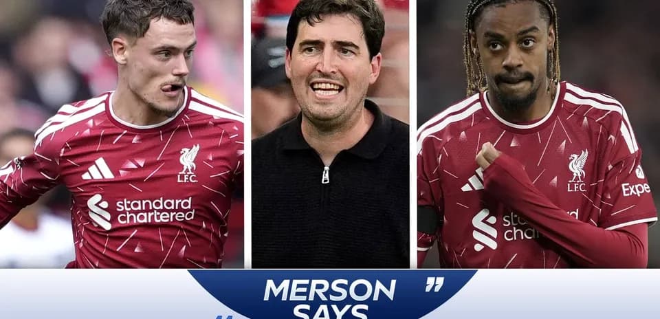 Liverpool players and coach during match discussion