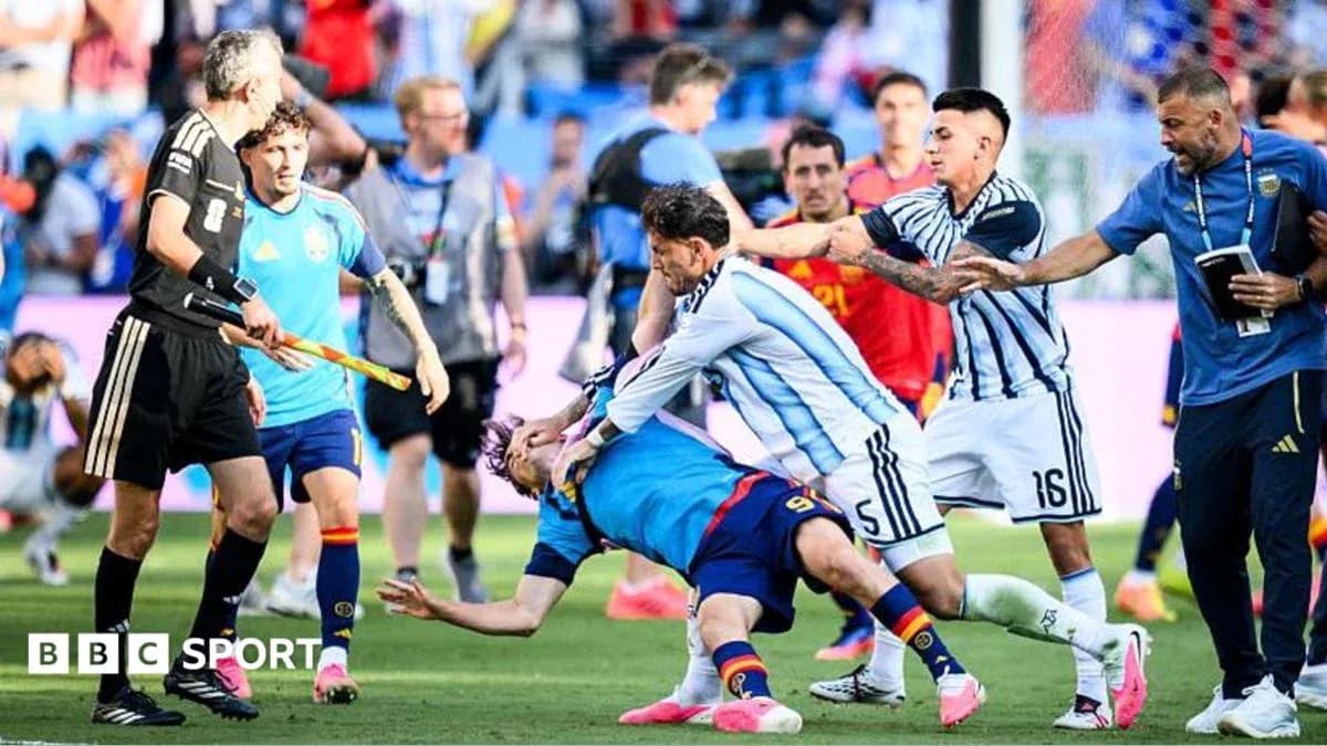 Players clashing during heated match confrontation Players clashing during heated match confrontation
