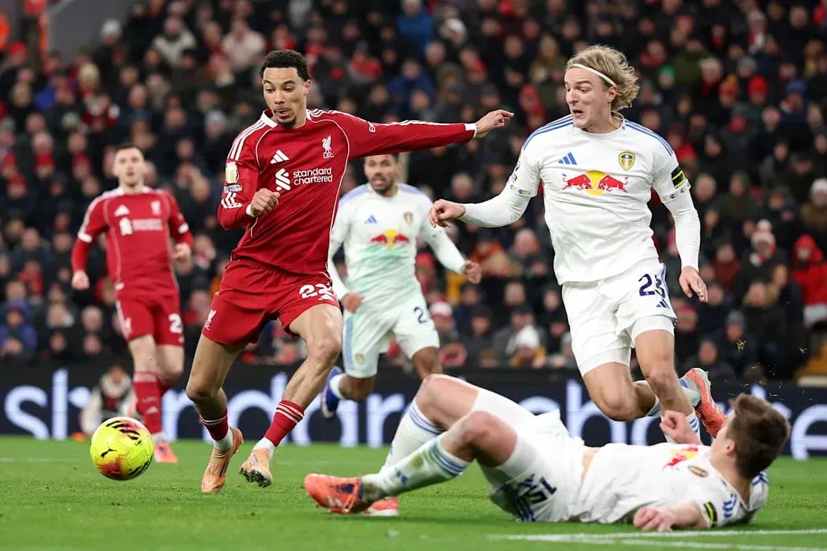 Liverpool and Leeds players contesting the ball Liverpool and Leeds players contesting the ball