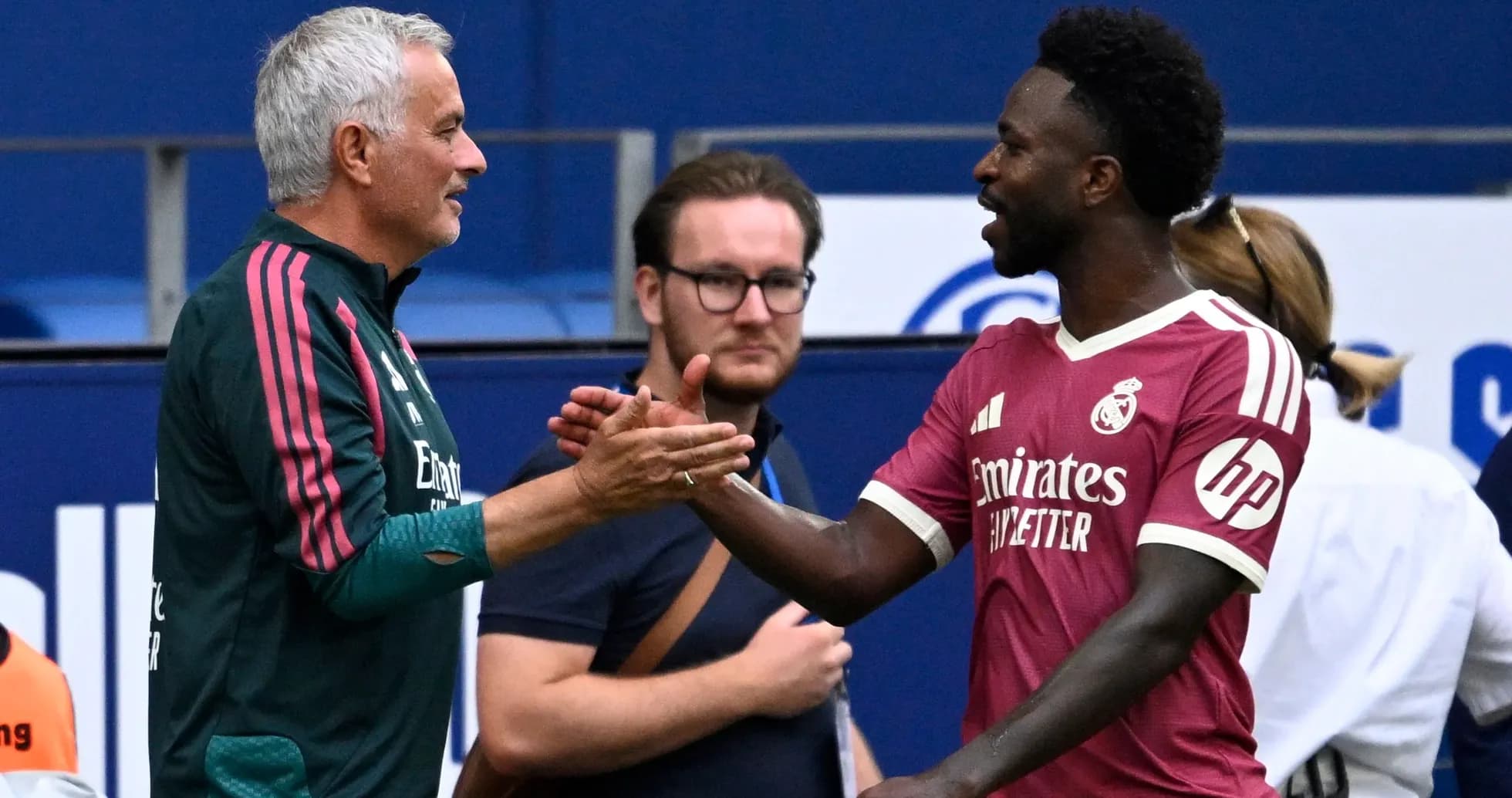 Mourinho and player shaking hands during match Mourinho and player shaking hands during match