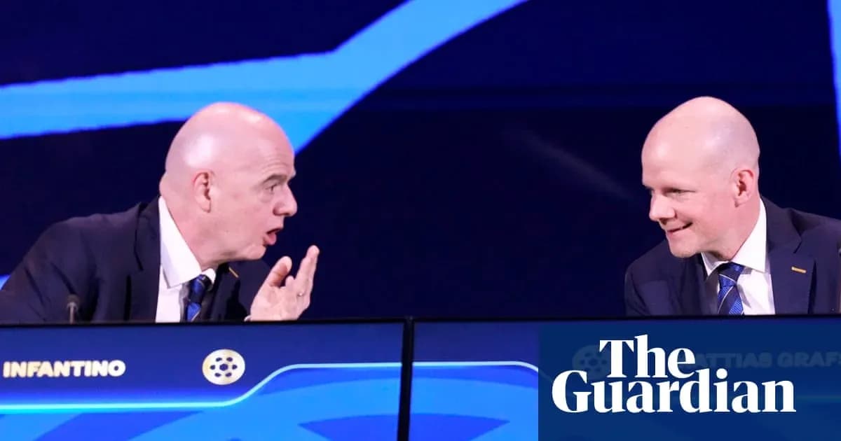 Two officials discussing at a conference table Two officials discussing at a conference table