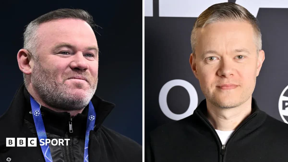 Two men posing for photos at an event Two men posing for photos at an event