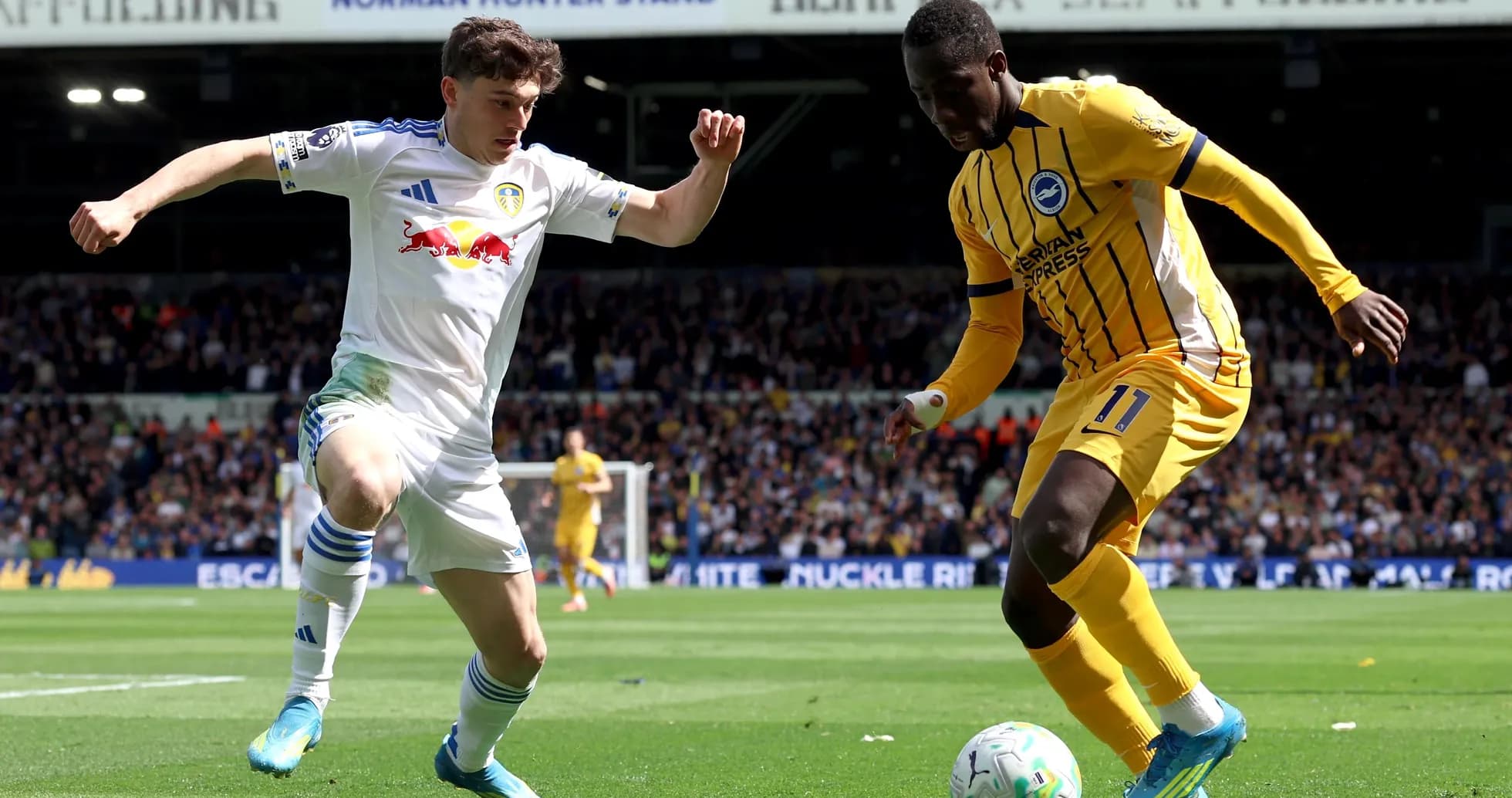 Leeds and Brighton players contesting for the ball Leeds and Brighton players contesting for the ball