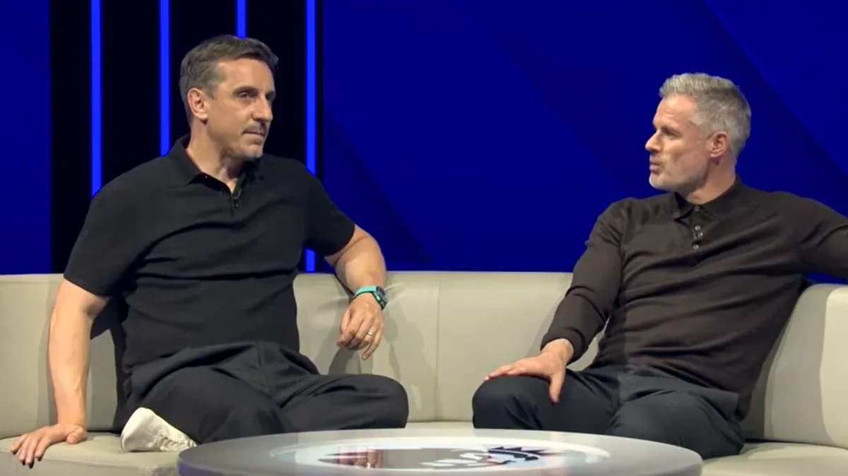 Two analysts discussing on a studio sofa Two analysts discussing on a studio sofa
