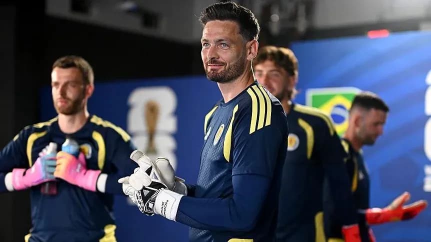 Goalkeeper preparing with teammates before match Goalkeeper preparing with teammates before match