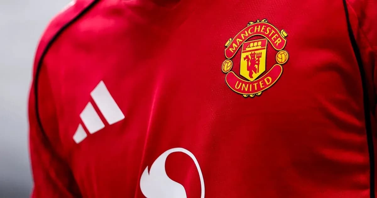 Manchester United logo on red football jersey Manchester United logo on red football jersey