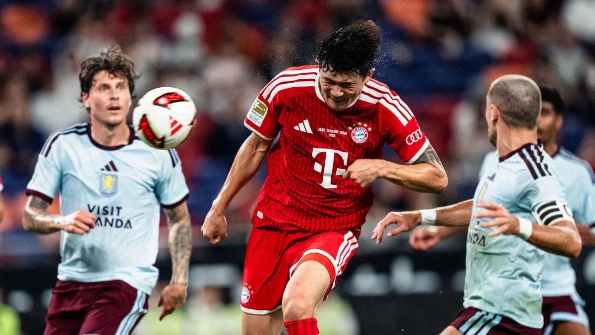 Bayern Munich player heading the ball during match Bayern Munich player heading the ball during match