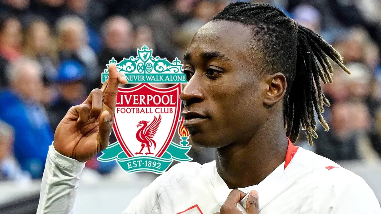 Futbolchi Liverpool logosi bilan raqobat qilmoqda Futbolchi Liverpool logosi bilan raqobat qilmoqda