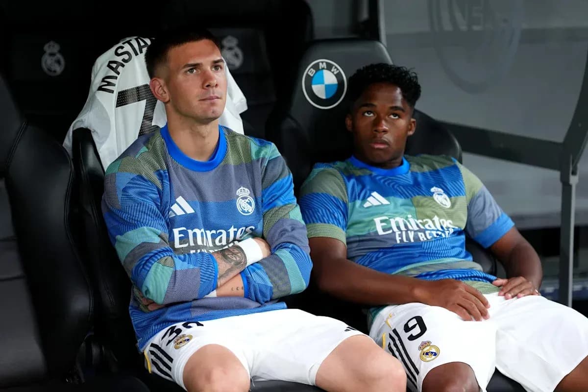 Real Madrid players sitting on the bench during match Real Madrid players sitting on the bench during match
