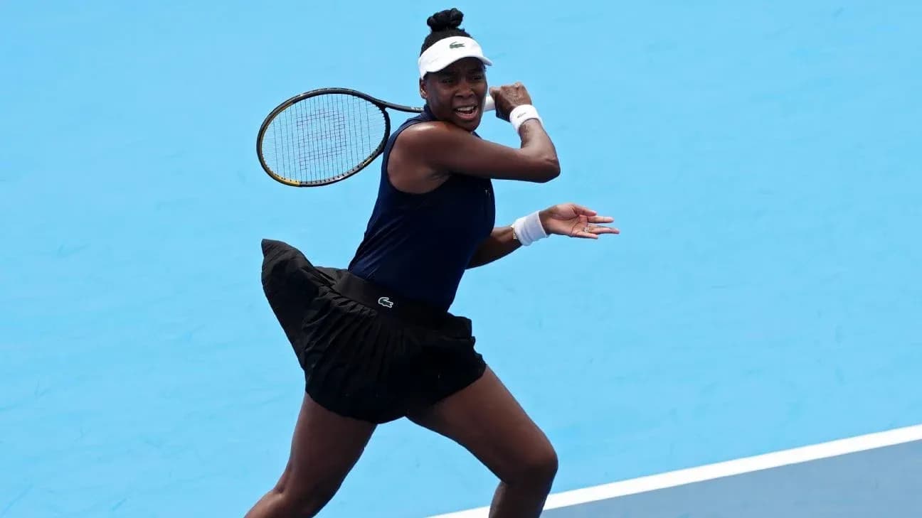 Tennis player hitting a forehand on court Tennis player hitting a forehand on court