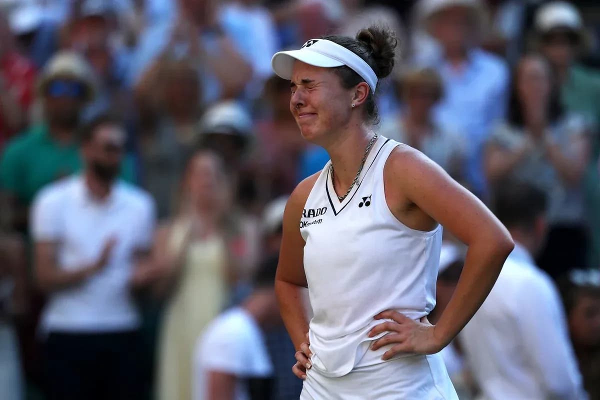 Tennis player reacting during a match at Wimbledon Tennis player reacting during a match at Wimbledon