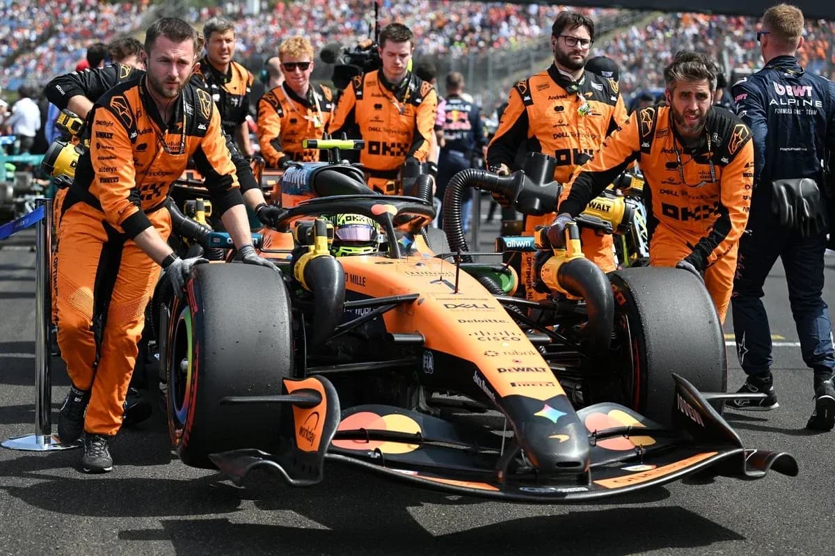 McLaren team preparing car on the grid McLaren team preparing car on the grid