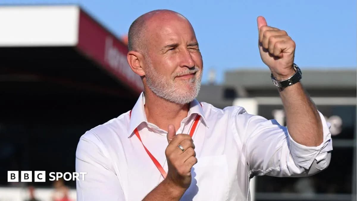 Men coach celebrating with a thumbs up gesture Men coach celebrating with a thumbs up gesture