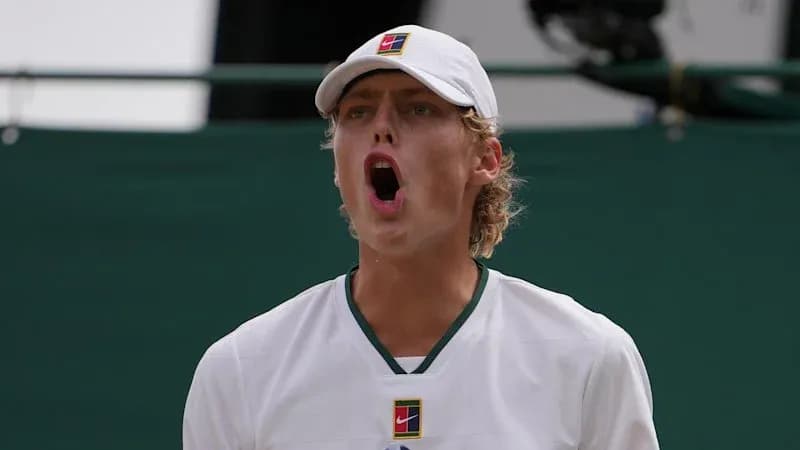 Tennis player celebrating a point during match Tennis player celebrating a point during match