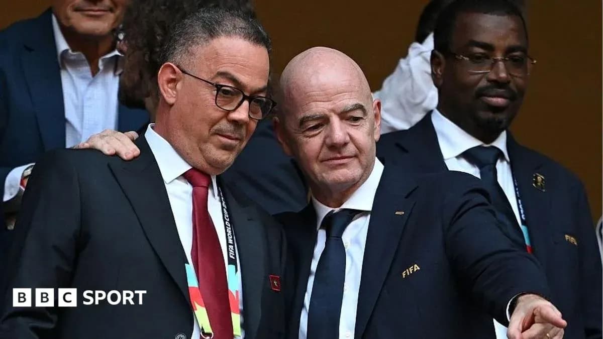 FIFA officials discussing during an event FIFA officials discussing during an event