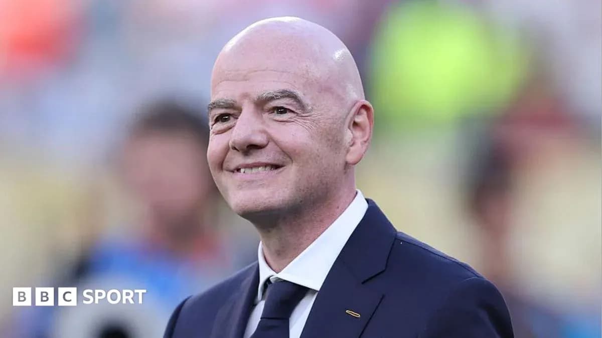 FIFA president smiling at event FIFA president smiling at event