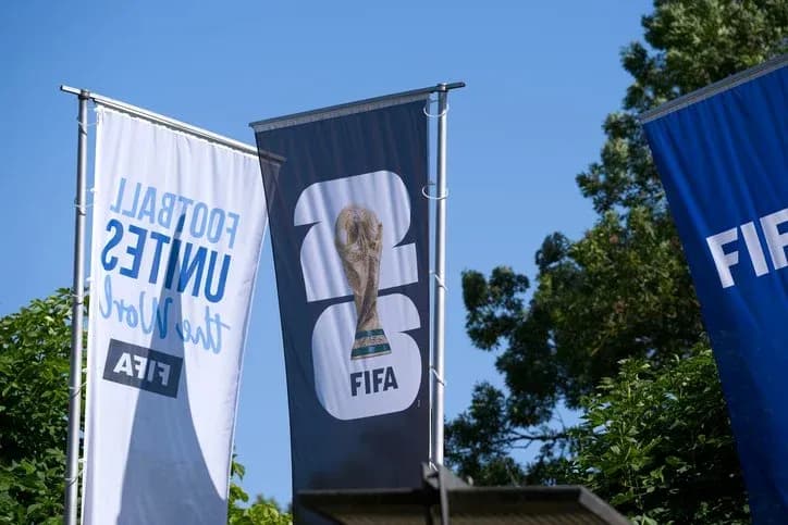 FIFA World Cup trophy on display with banners FIFA World Cup trophy on display with banners