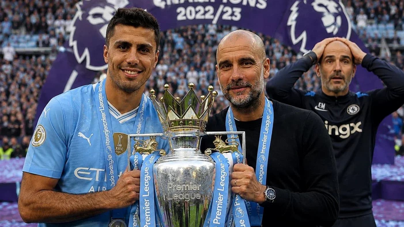 Futbolchilar Premier Lig chempionligi kubogini ushlab turishmoqda Futbolchilar Premier Lig chempionligi kubogini ushlab turishmoqda