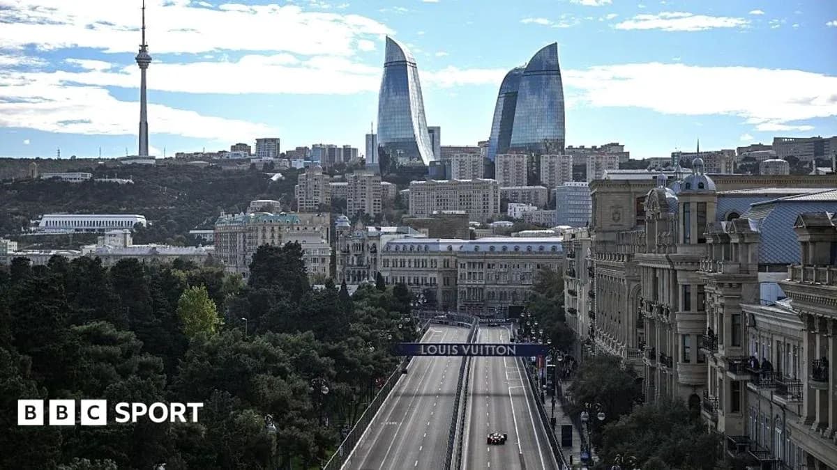 Formula 1 car racing on city street in Baku Formula 1 car racing on city street in Baku
