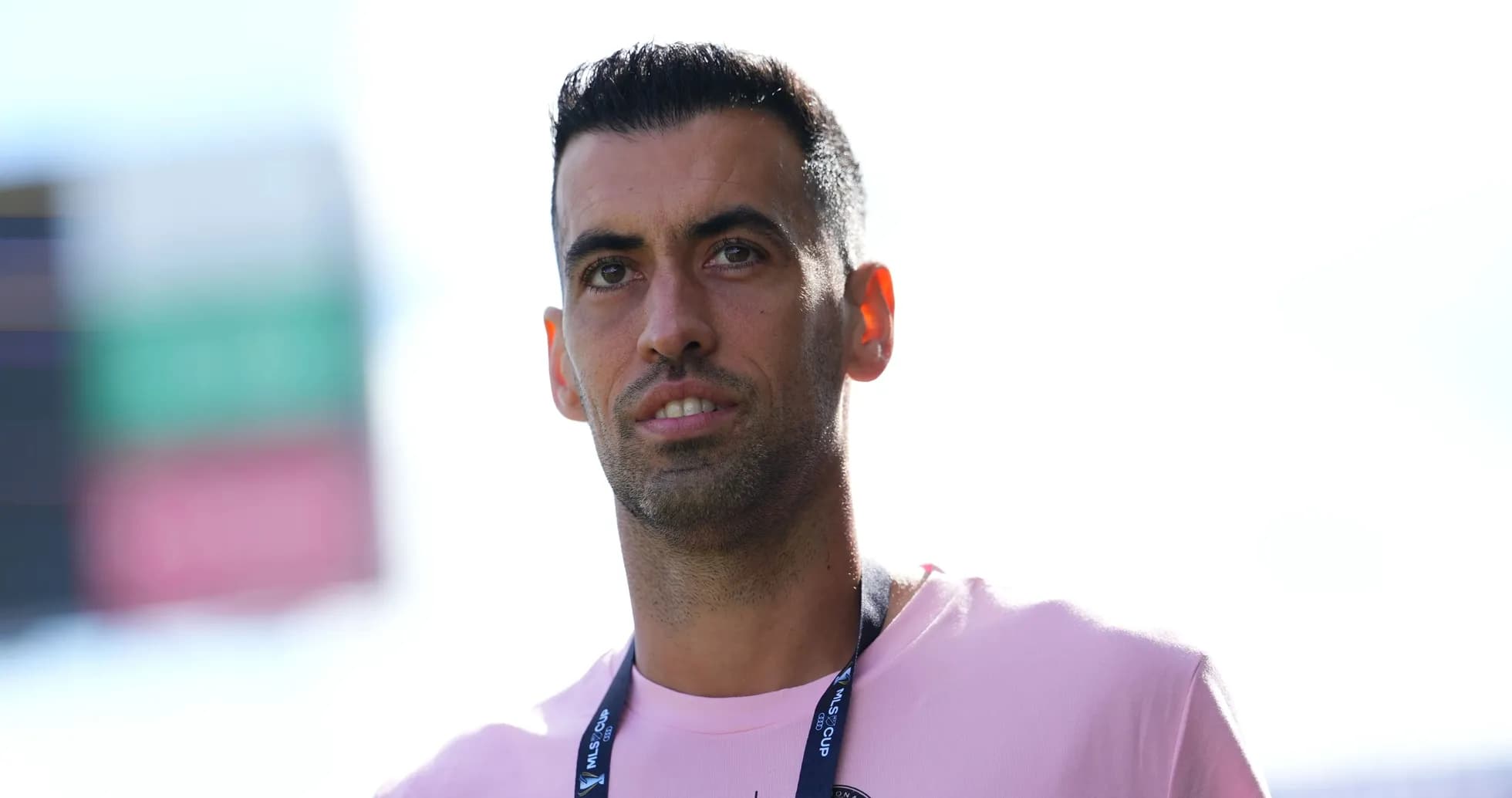 Football player in pink shirt during match day Football player in pink shirt during match day