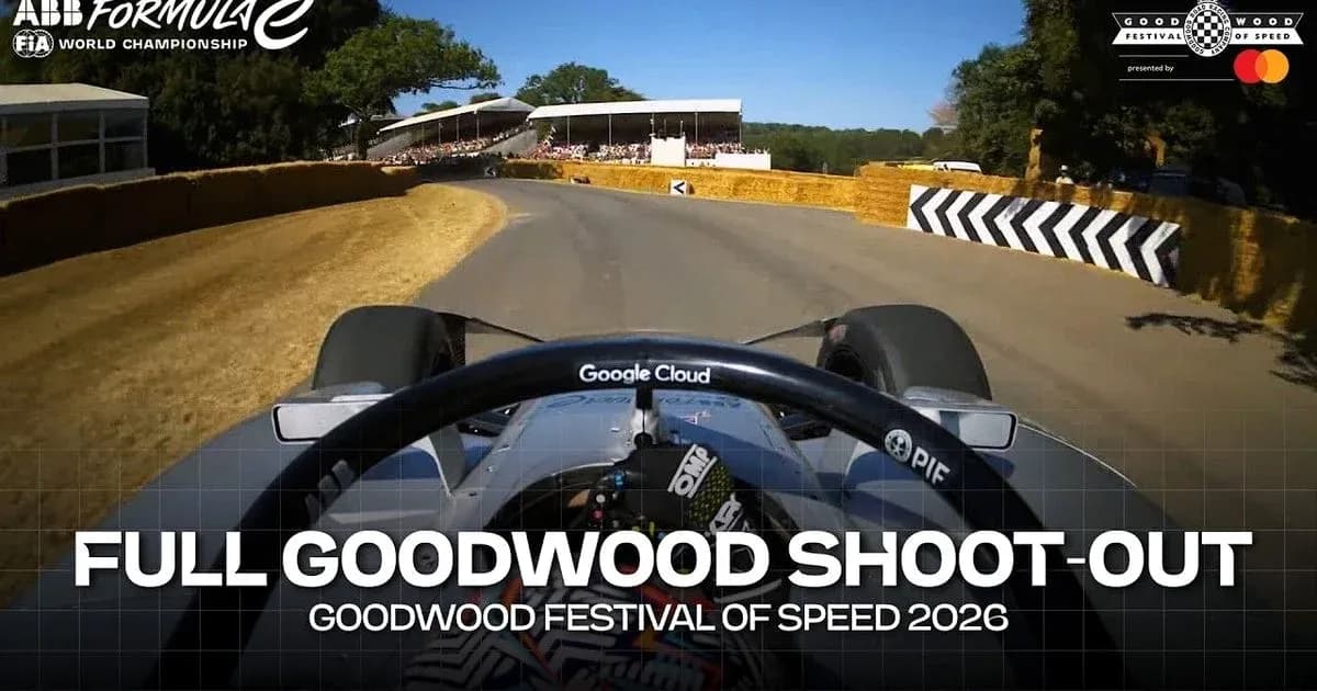 Formula E car navigating corner at Goodwood Festival Formula E car navigating corner at Goodwood Festival