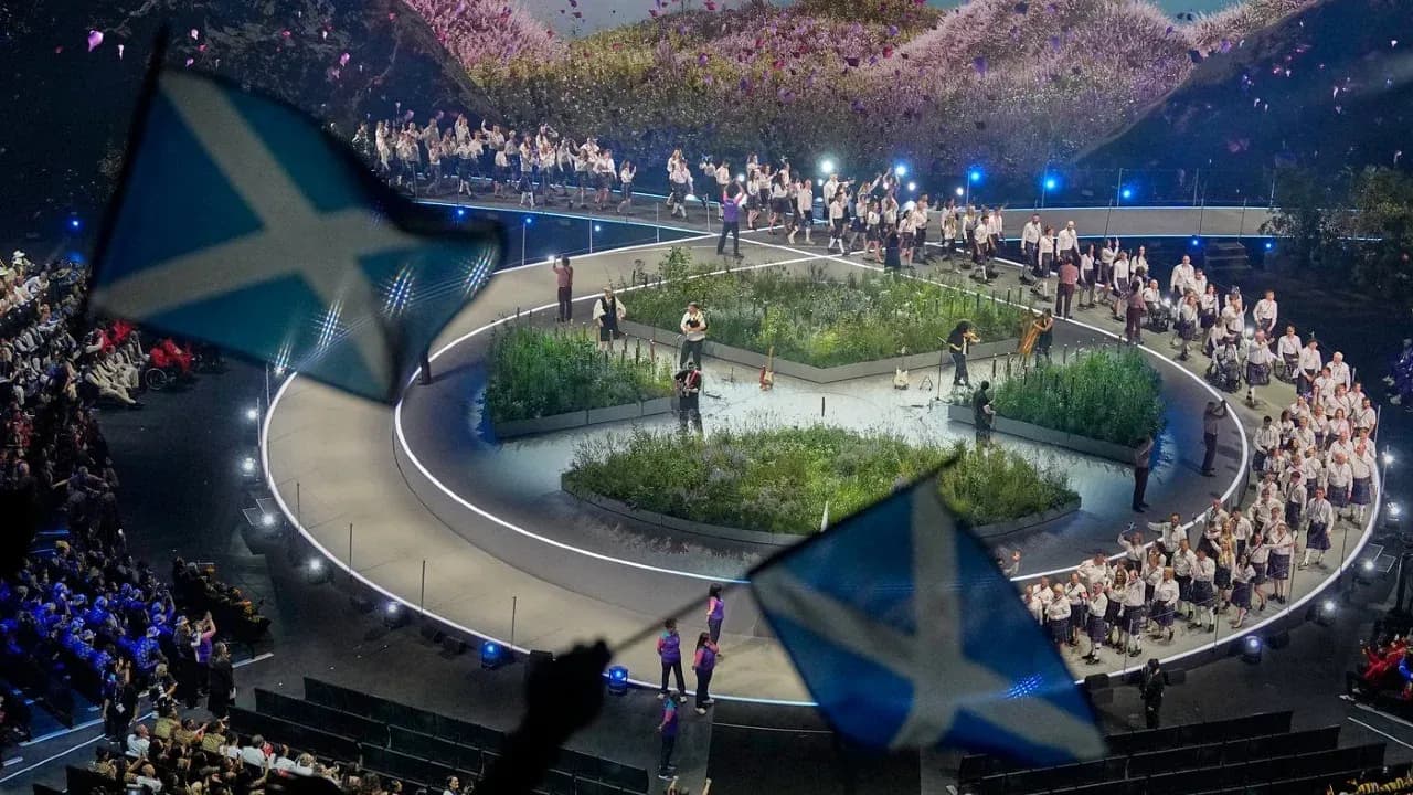Performance stage with audience and Scottish flags Performance stage with audience and Scottish flags