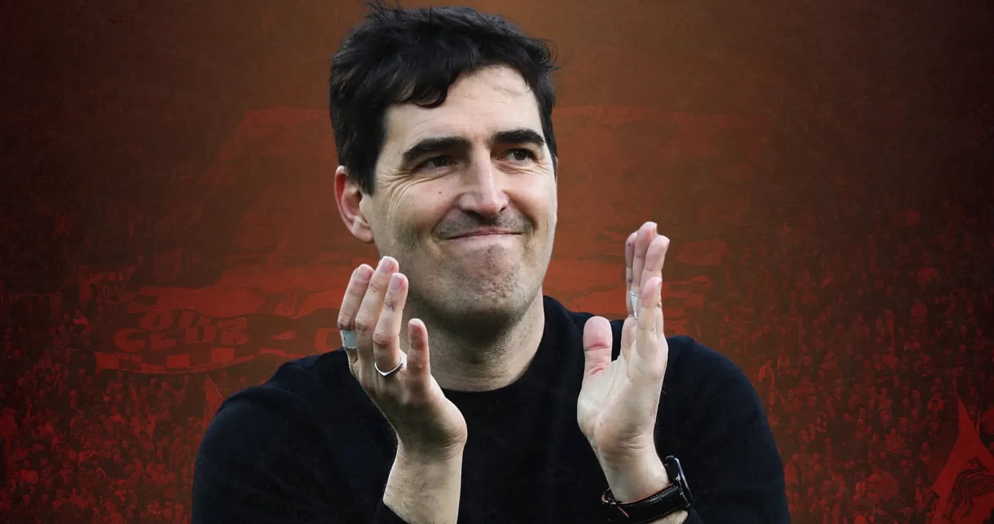 Man clapping in front of cheering crowd Man clapping in front of cheering crowd