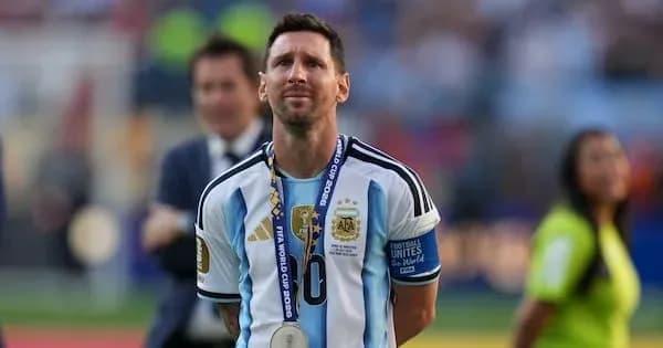 Lionel Messi wearing Argentina jersey with medal Lionel Messi wearing Argentina jersey with medal