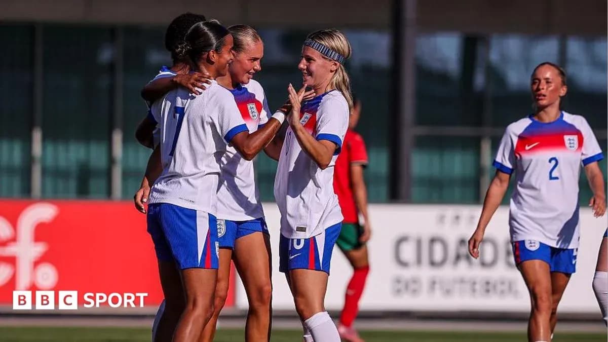 England women's team celebrating a goal on the field England women's team celebrating a goal on the field