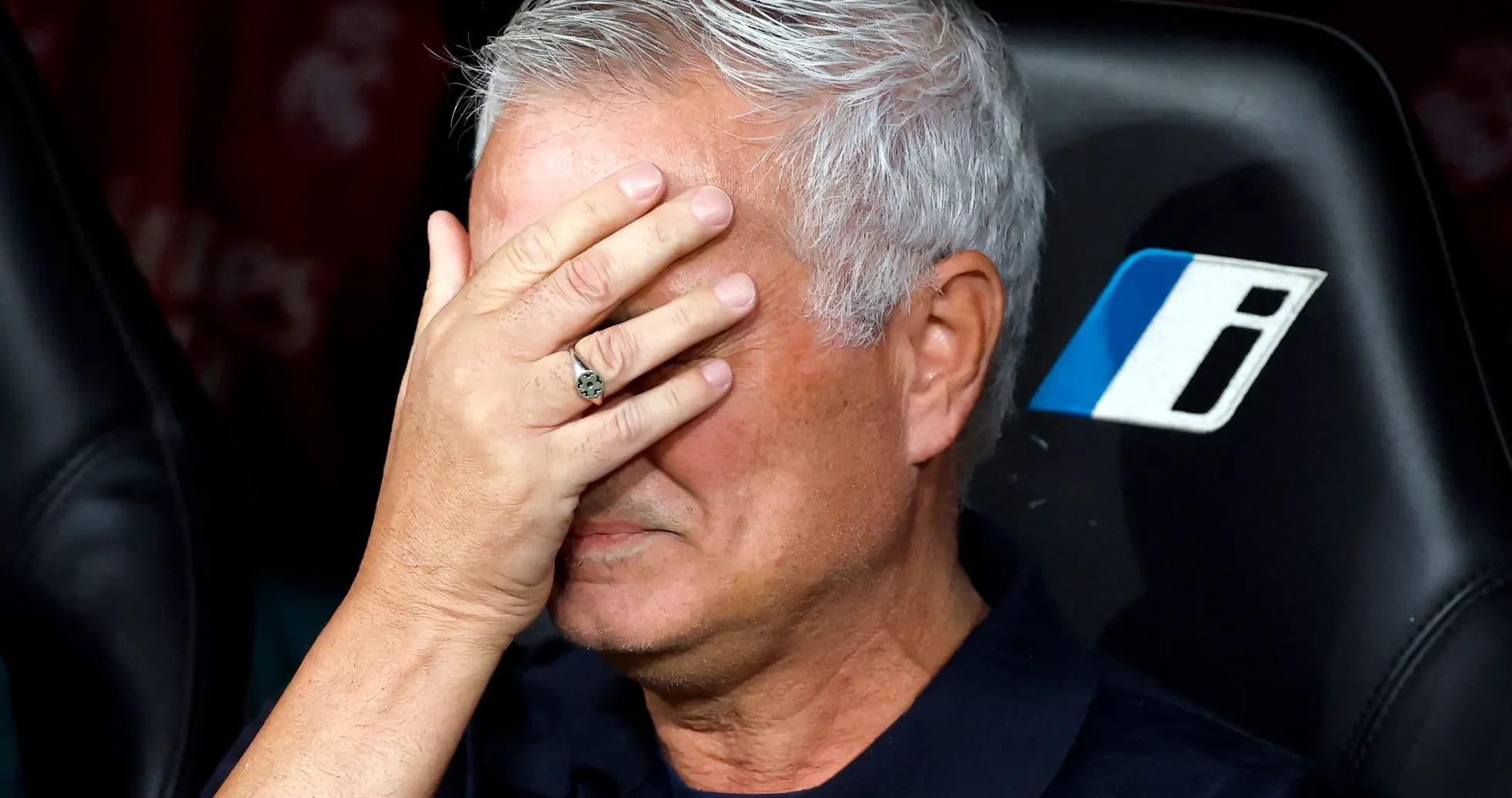 Mourinho covering his face during a match Mourinho covering his face during a match