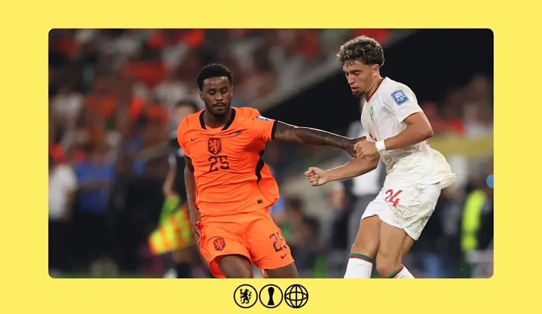Holland and Morocco players contesting for the ball Holland and Morocco players contesting for the ball
