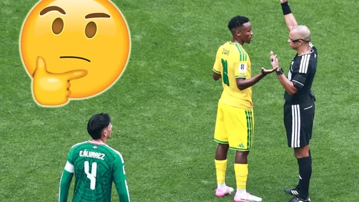 Player discussing with referee during a match Player discussing with referee during a match