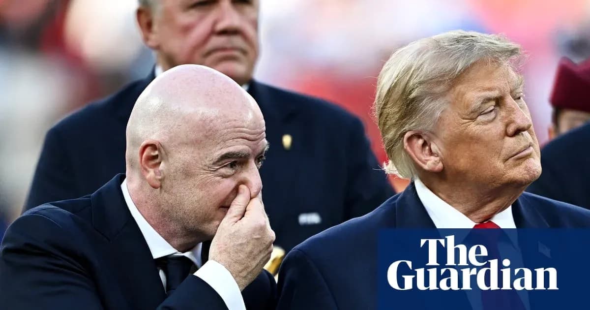Two men in suits at an event, one touching his face Two men in suits at an event, one touching his face