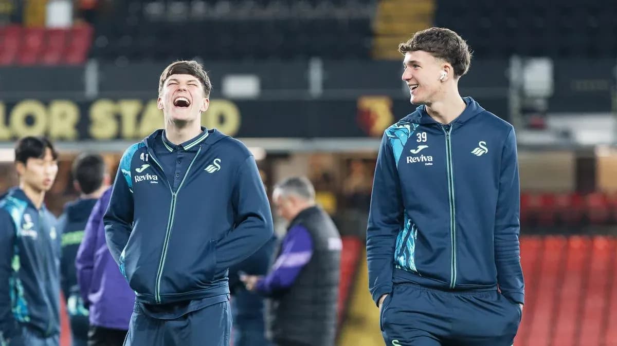 Swansea City players laughing during warm-up Swansea City players laughing during warm-up