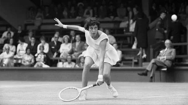 Tennis player hitting a forehand shot on court Tennis player hitting a forehand shot on court