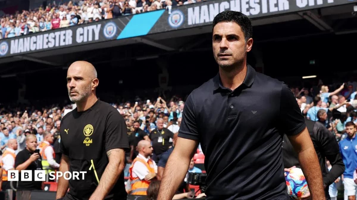 Two managers walking onto the pitch before match Two managers walking onto the pitch before match
