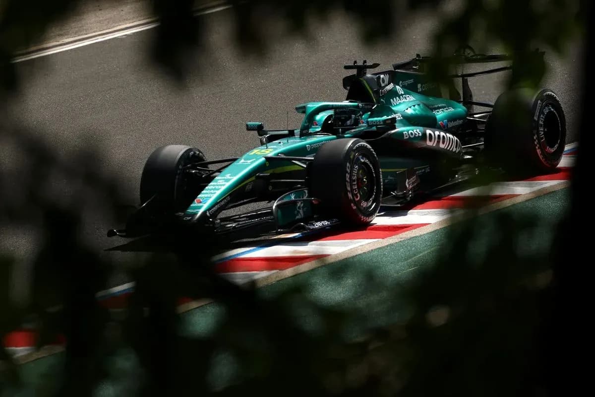 Formula 1 car on track during a race Formula 1 car on track during a race