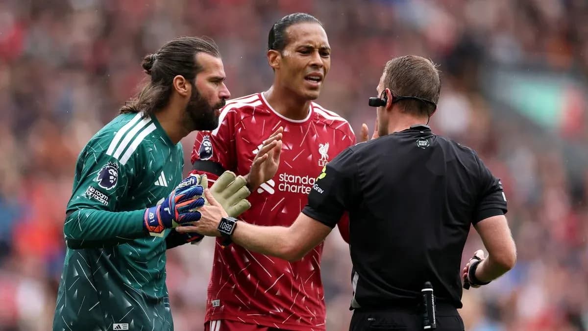 Alisson and Van Dijk arguing with referee Alisson and Van Dijk arguing with referee