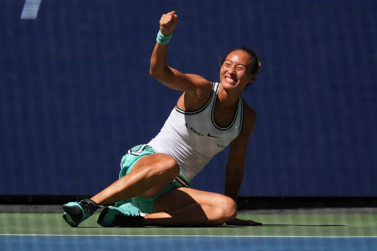 Tennis player celebrating on the court after winning point Tennis player celebrating on the court after winning point