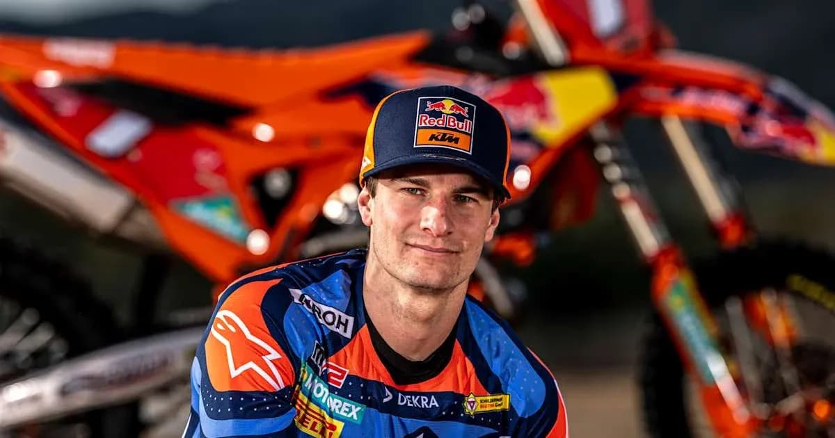 Motocross rider posing with KTM bike Motocross rider posing with KTM bike