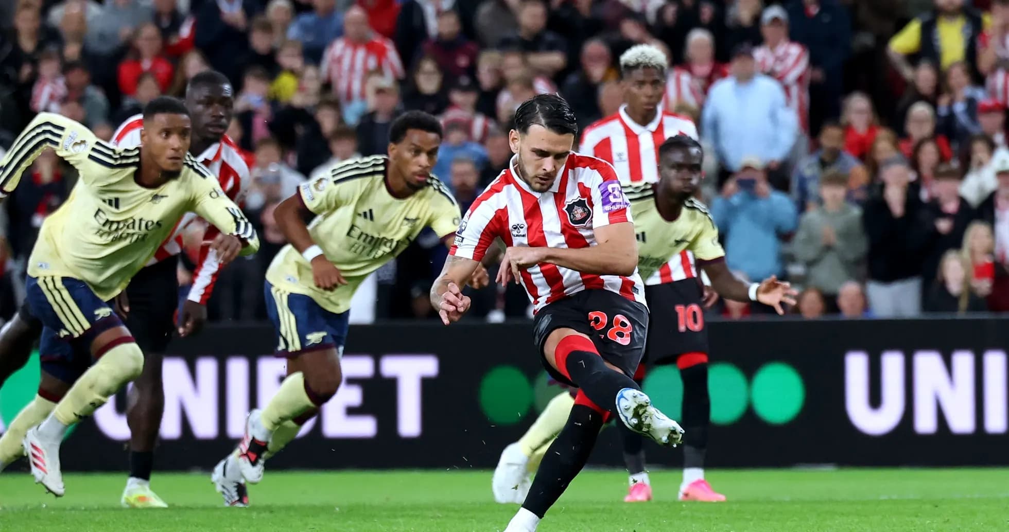 Player taking a penalty kick during match Player taking a penalty kick during match