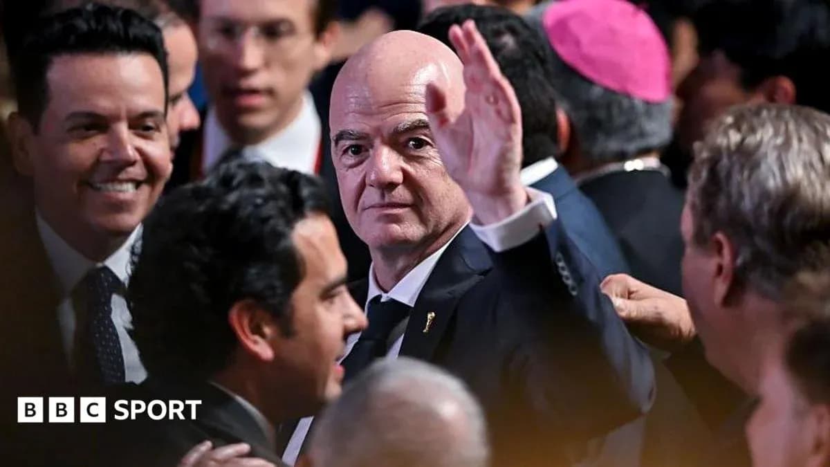FIFA president greeting crowd at event FIFA president greeting crowd at event