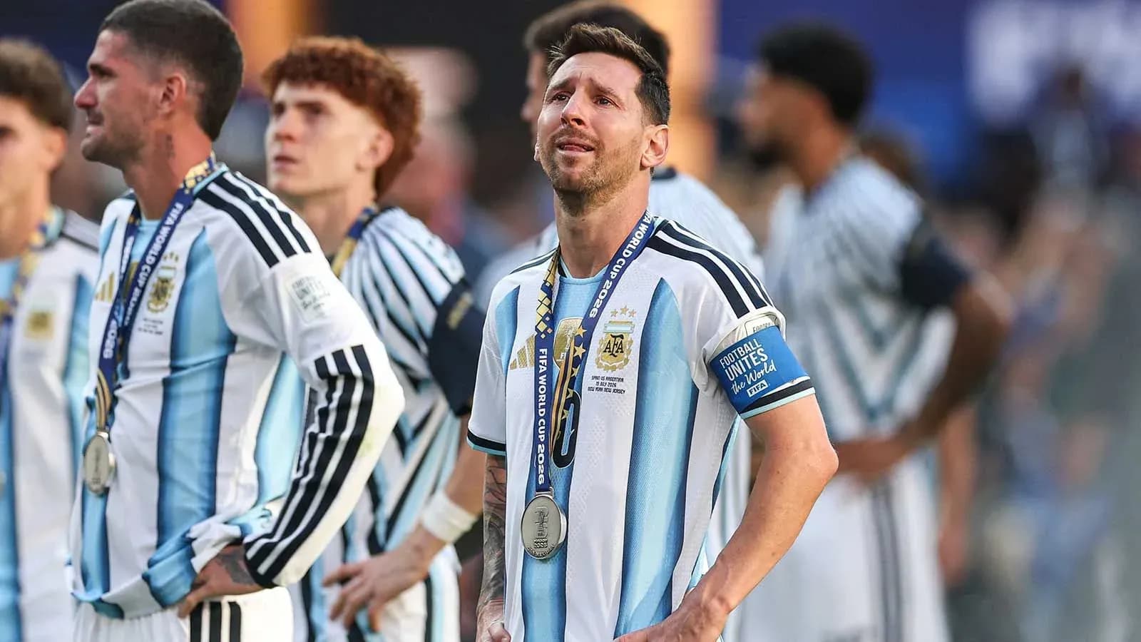 Lionel Messi with silver medal after match Lionel Messi with silver medal after match