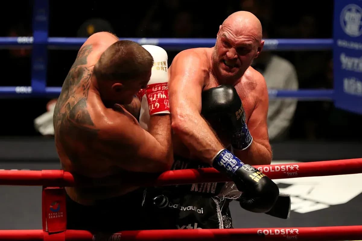 Boxers exchanging punches in the ring during match Boxers exchanging punches in the ring during match