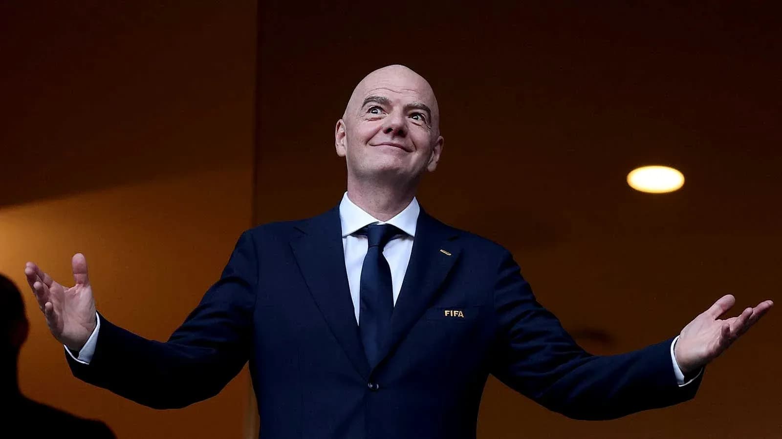 FIFA president speaking at an event FIFA president speaking at an event