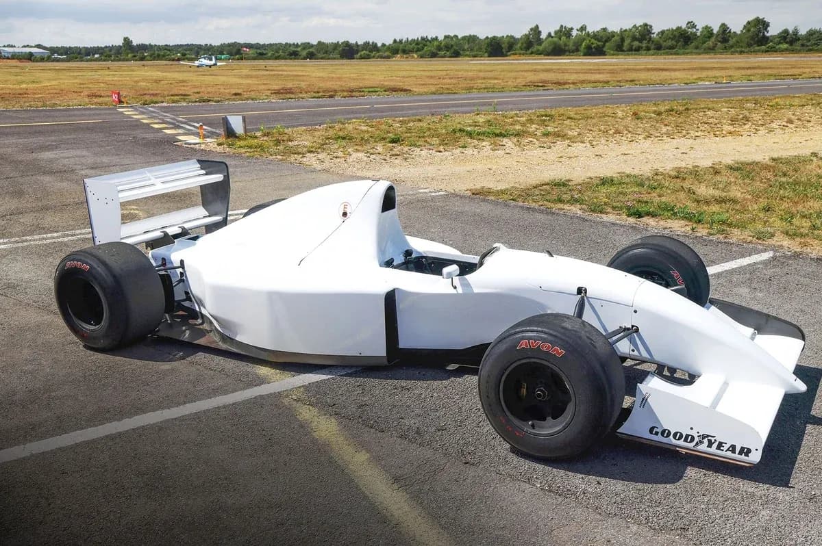 Formula car parked on an airstrip Formula car parked on an airstrip