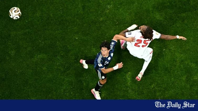 Two players competing for the ball during match Two players competing for the ball during match