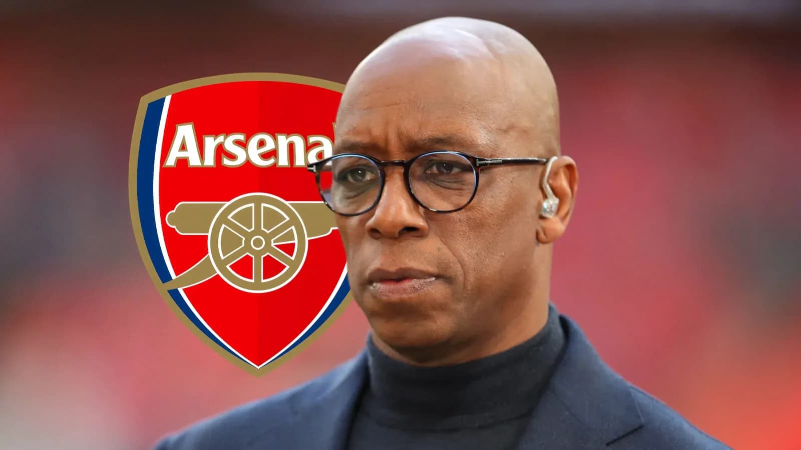 Analyst in front of Arsenal club logo Analyst in front of Arsenal club logo